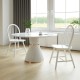 Vintage Windsor wood chairs with spindle back in white, perfect for dining rooms, featuring ergonomic design and.